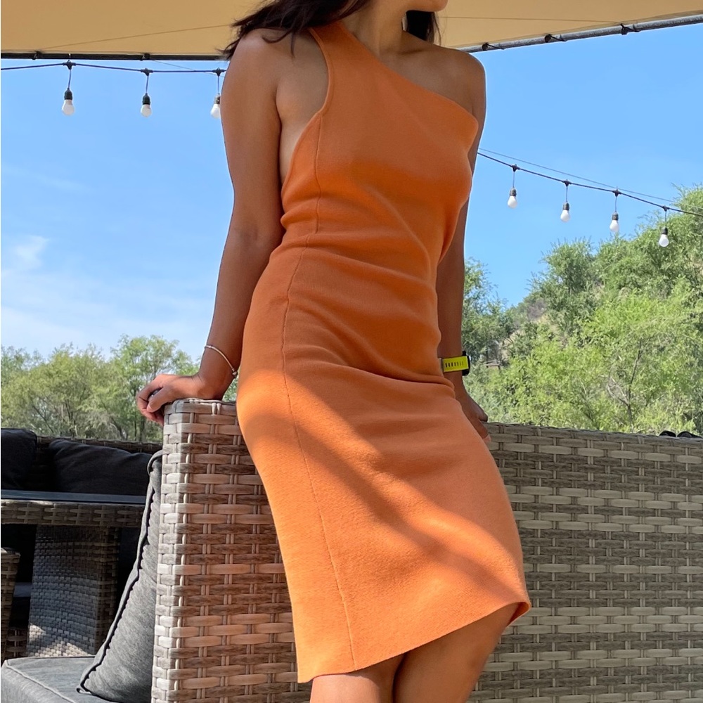 Orange one shoulder dress from Russian designer. Size M. Worn once.